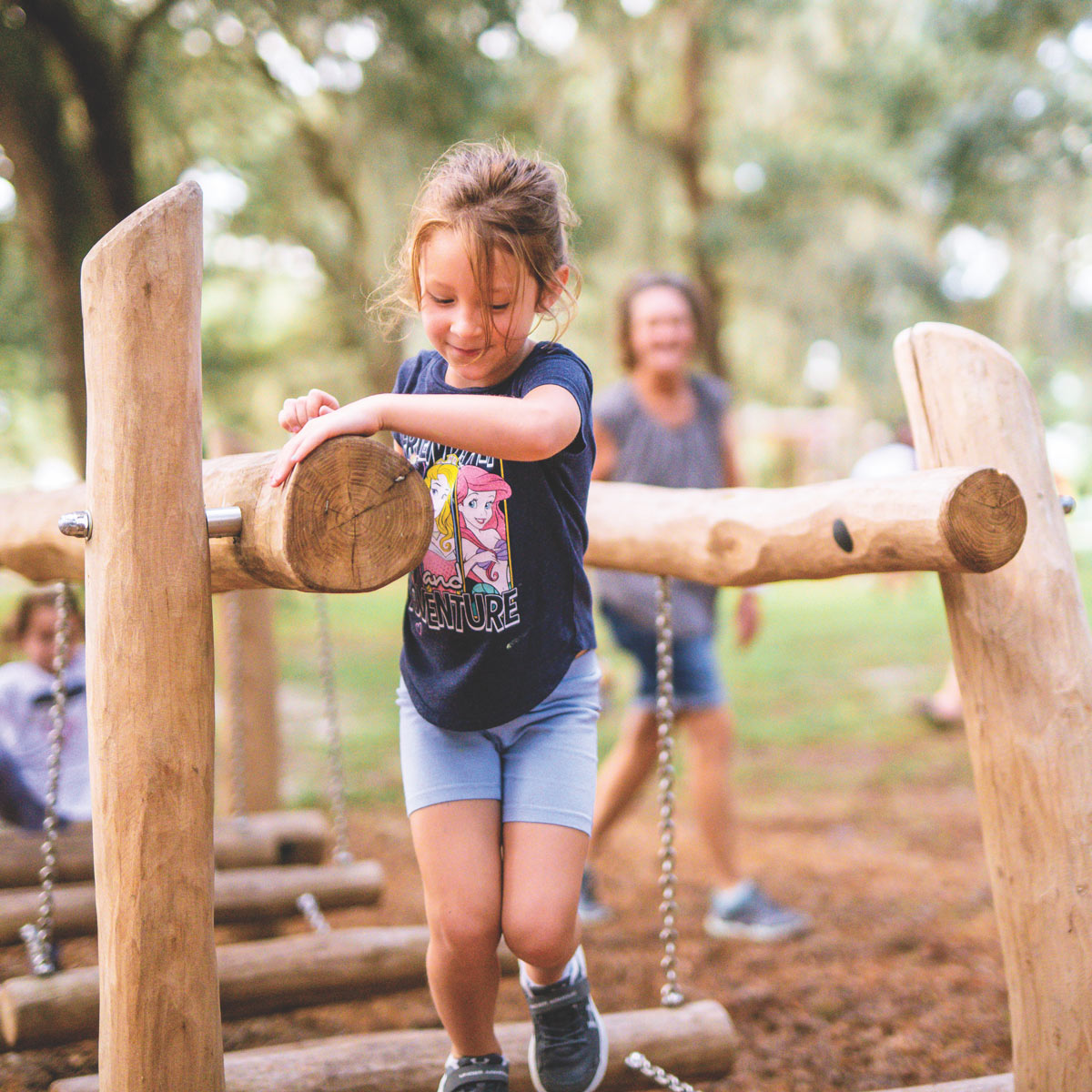 Playing on wooden playset